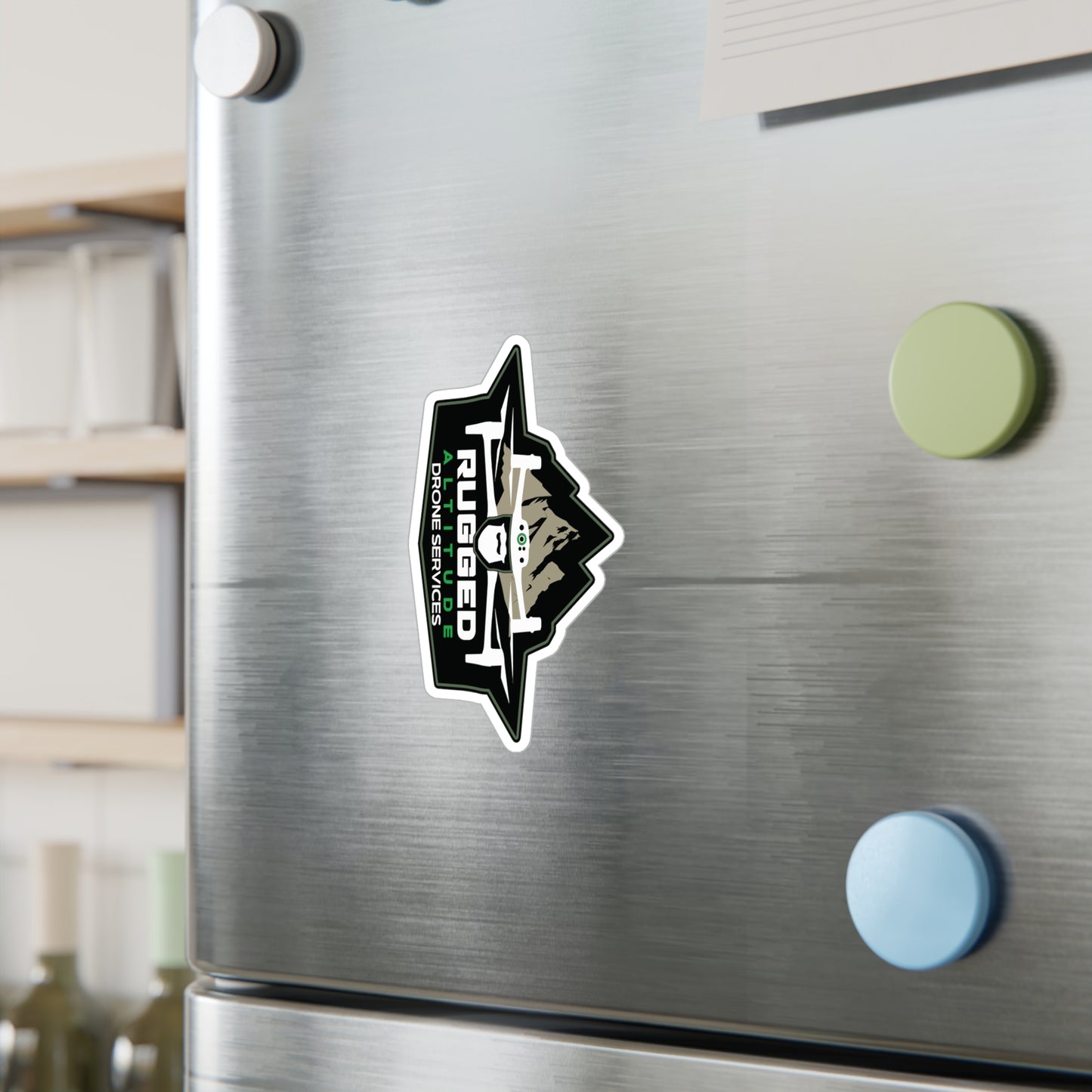 Rugged drone service vinyl decals sticker on a silver stainless steel refrigerator door