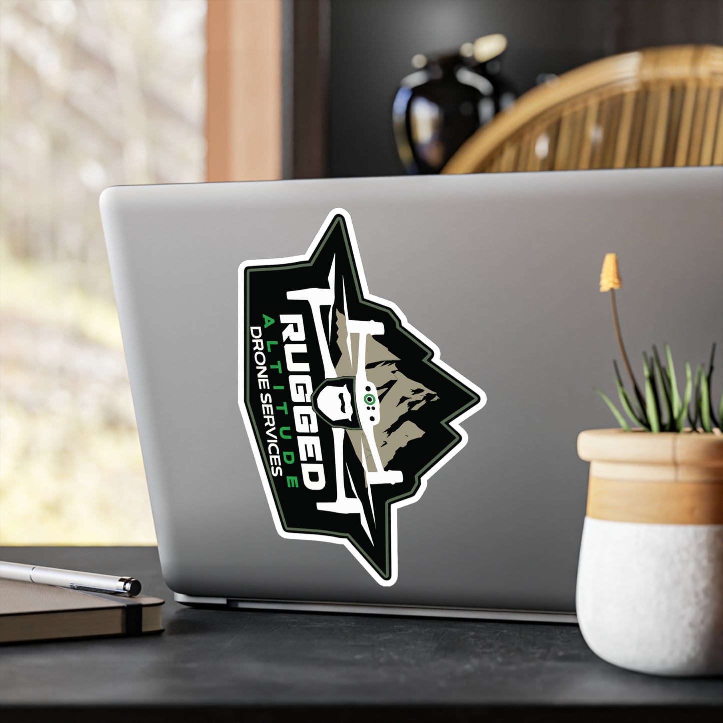 Printify drone service vinyl decals featuring rugged drone design on laptop surface