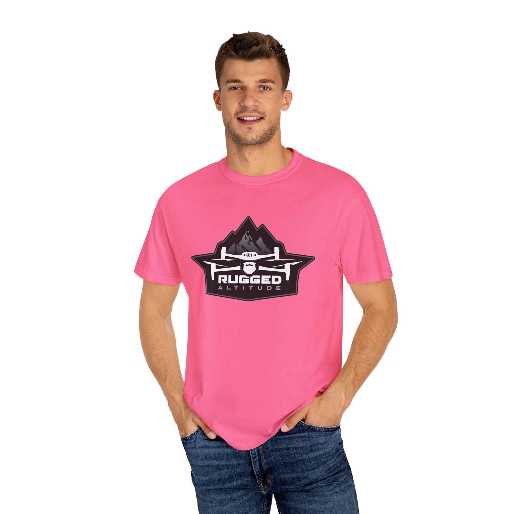 Pink Printify T-Shirt with rugged altitude logo worn by man promoting deer recovery services